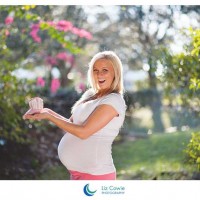 Holding baby cowgirl boots