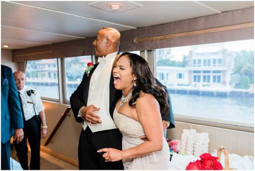 Laughing bride on yacht wedding
