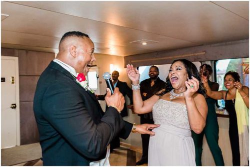 Bride laughing and dancing South Florida Wedding