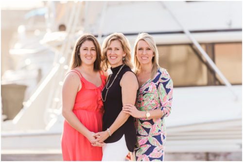 Melbourne, Florida family photographer adult children by boats photo by Liz Cowie Photography