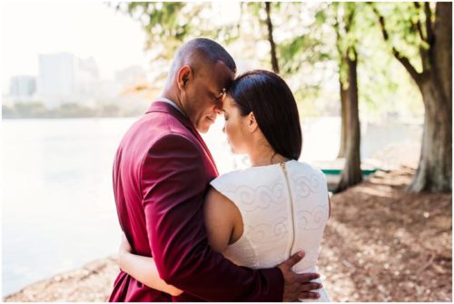 foreheads together Lake Eola Engagment