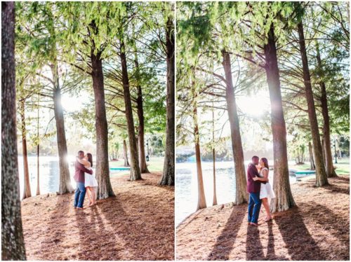 couple kissing in sun at Lake Eola engagement