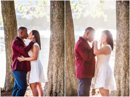 couple kissing in sun at Lake Eola engagement
