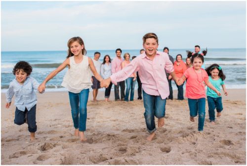 Melbourne Beach Family Photography kids in bright colors running on beach photo by Liz Cowie Photography