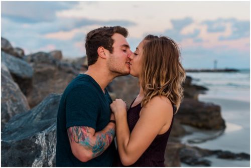 Couple kissing at Jetty Park Engagement
