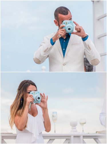 Bride and groom taking pictures