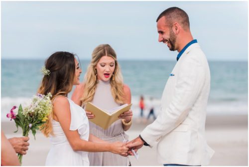 Ceremony on beach Bride and groom at beach elopement at Windemere by the Sea