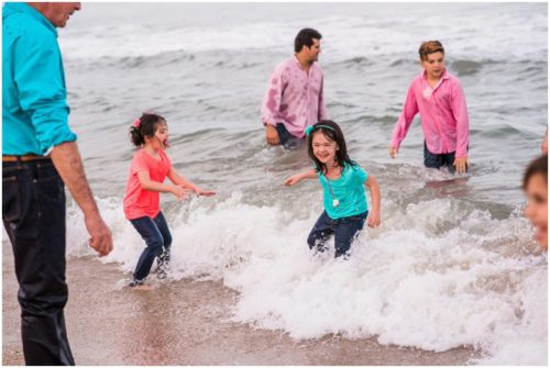 Kids in water at Melbourne Beach family portrait session