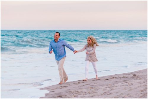 running down beach at Vero Beach Engagement