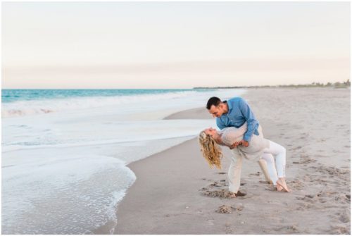 Man dipping girl at Vero Beach Engagement