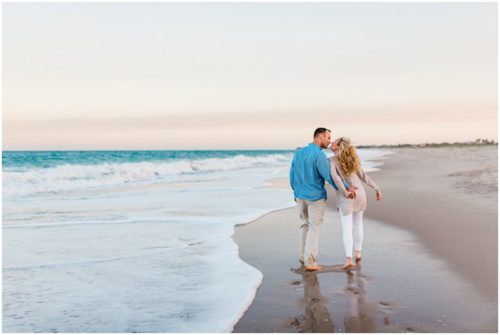 walking hand in hand at Vero Beach Engagement
