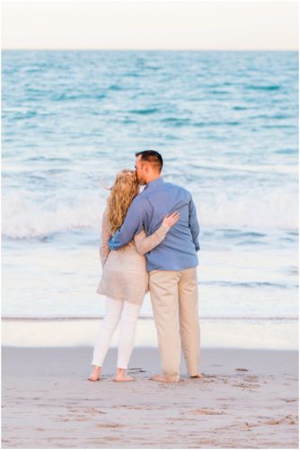 looking at the ocean at Vero Beach Engagement