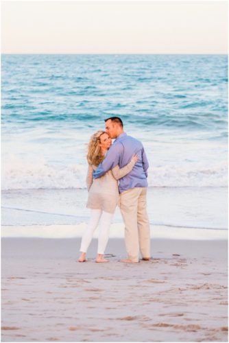looking at the ocean at Vero Beach Engagement