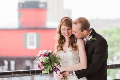 Destination Wedding in rain with smiling bride photo by Liz Cowie Photography