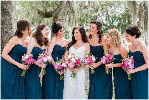Outdoor wedding with bridesmaids in blue