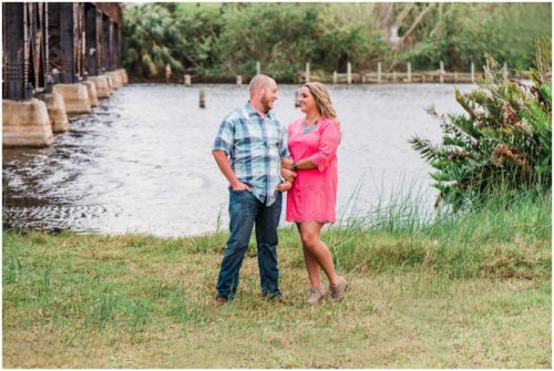 Couple under train bridge at downtown Melbourne engagement photography session