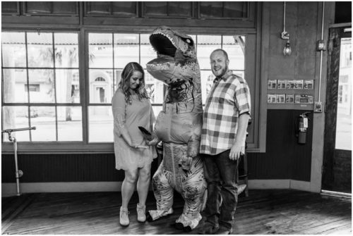 couple with t-rex t Melbourne engagement photography session