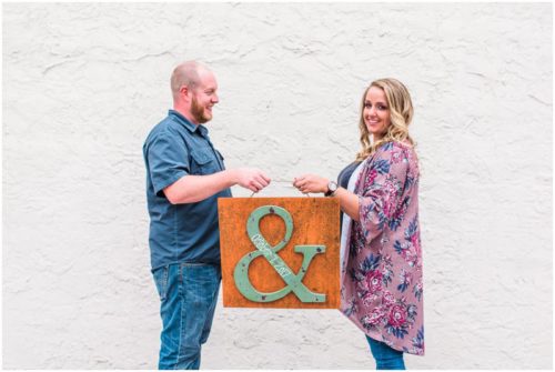 Couple holding wood letters t Melbourne engagement photography session
