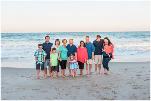 family portrait with ocean during Melbourne Beach Family Photography session