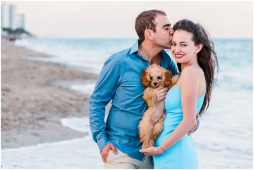 kissing check and holding dog South Florida engagement