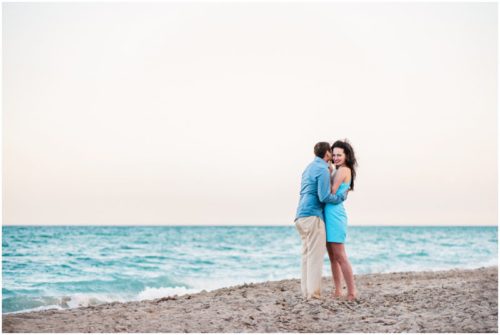 hugging by edge of ocean during South Florida engagement