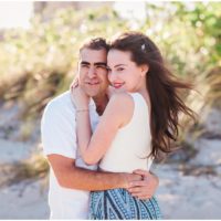 couple hugging each other during south Florida engagement