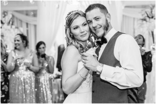 Bride and groom walking on dock at Crystal Ballroom Wedding
