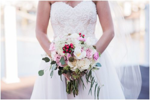 bride with bouquet at Crystal Ballroom Wedding