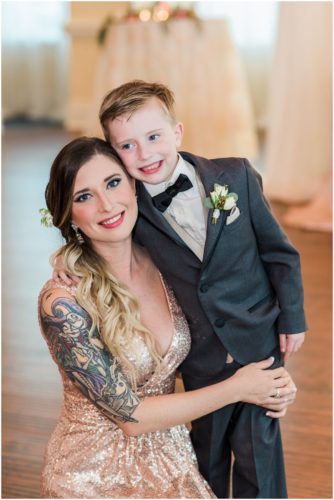 Best friend of bride with child at Crystal Ballroom Wedding