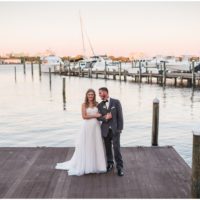 Couple walking on dock at Crystal Ballroom Wedding