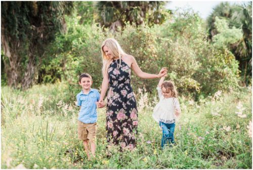 Melbourne Florida Family Photographer Momm walking with kids photo by Liz Cowie Photography