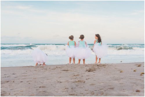 One girl bending over during Melbourne Beach Family Photography session