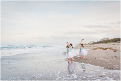 Girls standing by ocean during Melbourne Beach Family Photography session
