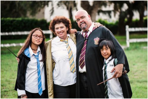 Fun Family Portraits Family in robes and wands