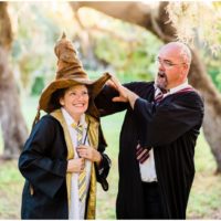 Fun Family Portraits Mom getting sorted by Harry Potter hat