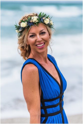 Beautiful bride with flower crown and electric blue dress during Melbourne Beach Florida engagement session