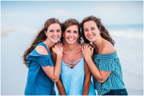 Mom with daughters in blue on beach Melbourne Beach Family Photography