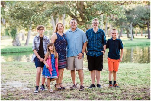 Family by lake during Gleason Park Family Portraits