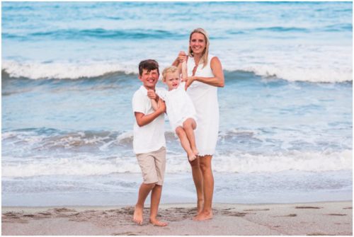 Mom and son swinging little girl during Melbourne Beach Family Portraits