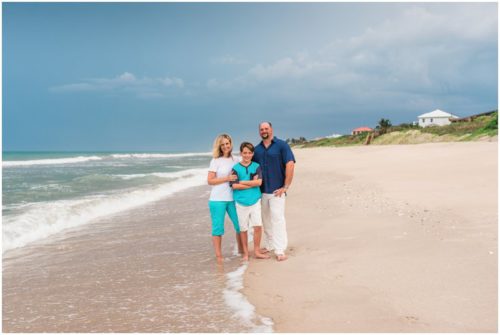 Family with storm rolling in during fun family portraits