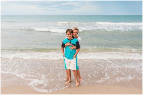 Mom and son by the ocean