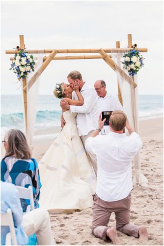 first kiss during gorgeous melbourne beach wedding