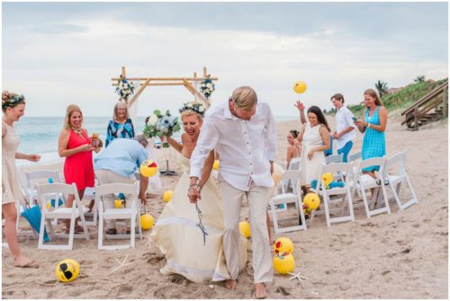 throwing beach balls during gorgeous melbourne beach wedding