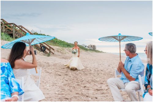 Bride walking down isle during gorgeous Melbourne Beach wedding