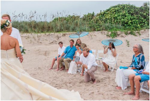 Brother on FaceTime with dad during gorgeous Melbourne Beach wedding