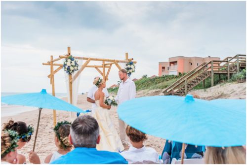 Saying vows on beach during gorgeous Melbourne Beach wedding