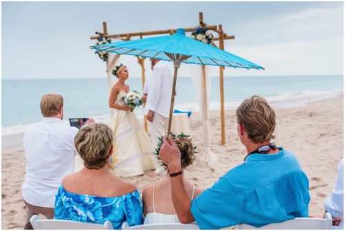 Saying vows on beach during gorgeous Melbourne Beach wedding