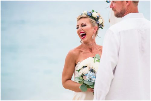 bride laughing during gorgeous Melbourne Beach wedding