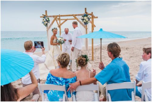 saying vows on beach during gorgeous Melbourne Beach wedding