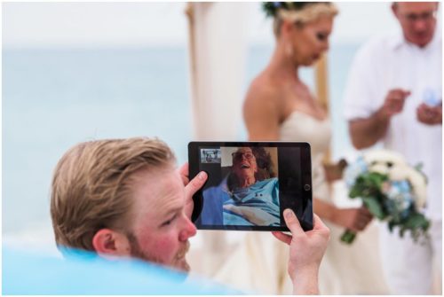 facetiming in grooms father during gorgeous Melbourne Beach wedding